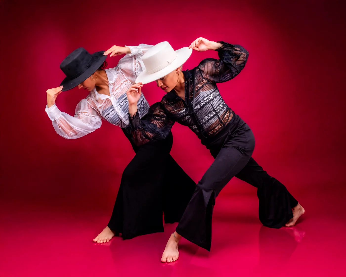 A flamenco dancer in a ruffled dress mid-movement